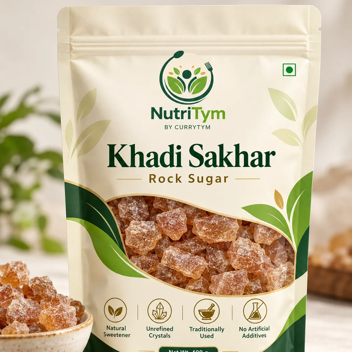 A pouch of NutriTym Khadi Saakar rock sugar with crystals in a bowl